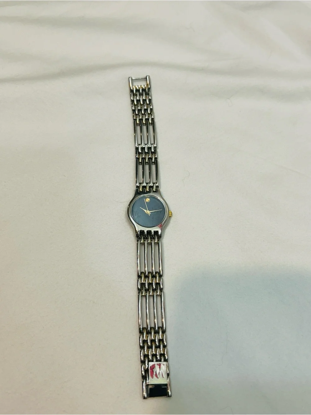 Women's Silver Bracelet Watch with Black Dial and Gold Accents